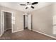 Spacious bedroom with ceiling fan and access to closet at 6972 Placid Lake Ave, Las Vegas, NV 89179