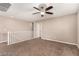 Spacious loft area with wood flooring and a ceiling fan at 6972 Placid Lake Ave, Las Vegas, NV 89179