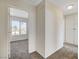 Hallway with carpet, leading to bedrooms and other rooms at 6981 Wedgewood Way, Las Vegas, NV 89147