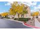 Two-story house with a walkway to the front door and yellow trees at 7587 French Springs St, Las Vegas, NV 89139