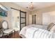 Serene bedroom with sliding barn door to the bathroom at 8824 Prague Ct, Las Vegas, NV 89147