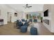 Living room with hardwood floors, fireplace, and plenty of natural light at 9524 Sundial Dr, Las Vegas, NV 89134