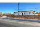 Newly renovated single story home with modern facade and wood fence at 103 Magnesium St, Henderson, NV 89015