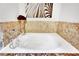 Relaxing jetted bathtub with marble surround at 360 E Desert Inn Rd # 1803, Las Vegas, NV 89109