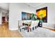 Elegant dining room with hardwood floors and modern glass wall at 360 E Desert Inn Rd # 1803, Las Vegas, NV 89109