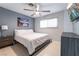 Bright bedroom with a king-size bed and modern nightstands at 4261 El Moor Way, Las Vegas, NV 89121