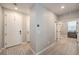 Bright entryway with wood-look floors and access to office at 5407 Zacatin Ct, Las Vegas, NV 89166