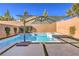 Clean lines and a refreshing pool with plenty of space for relaxation at 5407 Zacatin Ct, Las Vegas, NV 89166