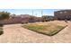 Community BBQ and picnic area with grassy space at 6250 Buffalo Spring Ct, Las Vegas, NV 89122