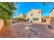 Backyard view of house with patio at 6512 Copper Smith Ct, North Las Vegas, NV 89084