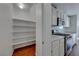 Bright pantry with ample shelving for storage at 6512 Copper Smith Ct, North Las Vegas, NV 89084