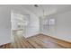 Bright dining area with hardwood floors and a chandelier at 6543 Stormy Sky Ave, Las Vegas, NV 89110