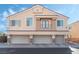 Three-car garage and two-story home at 6668 Lavender Lilly Ln # 3, North Las Vegas, NV 89084