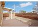 Backyard with covered patio and gravel landscaping at 7822 Shingle Beach St, Las Vegas, NV 89166