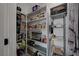 Well-organized pantry with ample shelving for storage at 1829 Sweeney Ave, Las Vegas, NV 89104