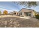 Backyard patio with gravel and partial view of the house at 2540 Eclipsing Stars Dr, Henderson, NV 89044