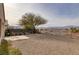 Spacious backyard with gravel and mountain views at 2540 Eclipsing Stars Dr, Henderson, NV 89044