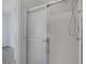 Shower stall with glass door and silver frame at 2540 Eclipsing Stars Dr, Henderson, NV 89044