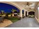 Evening view of backyard patio with seating area and landscaping at 2781 Josephine Dr, Henderson, NV 89044