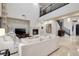 Elegant Gathering room featuring high ceilings, fireplace, and plenty of natural light at 2781 Josephine Dr, Henderson, NV 89044