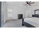 Main bedroom with king bed, access to bathroom and balcony at 2970 Gunnery Forge St, Las Vegas, NV 89156