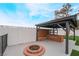 Landscaped backyard with pergola, fire pit and BBQ at 3467 W Mardon Ave, Las Vegas, NV 89139