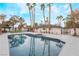 Relaxing pool area with palm trees and a large backyard at 3467 W Mardon Ave, Las Vegas, NV 89139