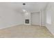 Living area with a fireplace and neutral wall colors at 3504 Frigatebird Ln, North Las Vegas, NV 89084