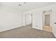 Spacious bedroom with mirrored closet doors and neutral carpeting at 6101 Pahoehoe Way, North Las Vegas, NV 89031