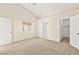 Bright bedroom featuring a large window and ample closet space at 6101 Pahoehoe Way, North Las Vegas, NV 89031