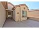 Front entry with a decorative door and welcoming mat at 7824 Homing Pigeon St, North Las Vegas, NV 89084