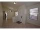 Bright dining area with tile floors and a chandelier at 11076 Zampino St, Las Vegas, NV 89141