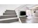 Modern gray and white staircase leading to upper level at 241 Misty Isle Ln # B, Las Vegas, NV 89107