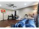 Bedroom with hardwood floors, basketball hoop, and desk at 2416 Legacy Island Cir, Henderson, NV 89074