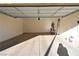 Attached garage with ample space for parking and storage at 304 Whitney Breeze Ave, North Las Vegas, NV 89031