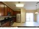 Modern kitchen that features stainless steel appliances and granite countertops at 304 Whitney Breeze Ave, North Las Vegas, NV 89031