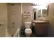 Clean bathroom with a bathtub, toilet and vanity at 3318 N Decatur Blvd # 1013, Las Vegas, NV 89130