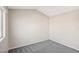 Empty bedroom with vaulted ceilings, gray carpet, and windows at 337 Warmside Dr, Las Vegas, NV 89145