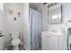 Clean bathroom with white vanity and shower/tub combo at 5011 Ada Dr, Las Vegas, NV 89122