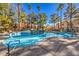 Inviting community pool with a fountain and lounge chairs at 508 Indian Princess Dr # 101, Las Vegas, NV 89145