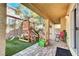 Spacious backyard with playset and covered patio at 8456 Blackstone Ridge Ct, Las Vegas, NV 89139