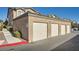 Three-car garage with individual doors and ample parking at 8985 S Durango Dr # 2117, Las Vegas, NV 89113