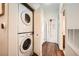 Stackable washer and dryer in a well-lit laundry closet at 8985 S Durango Dr # 2117, Las Vegas, NV 89113