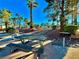 Picnic table and barbecue grill in a landscaped community area at 1024 Sun Wood Dr, Las Vegas, NV 89145