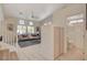 Light and airy living room with a view of the staircase at 10620 Austin Bluffs Ave, Las Vegas, NV 89144