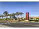 Modern Summerlin community entrance sign with palm trees and building views at 11576 Ashy Storm Ave, Las Vegas, NV 89138