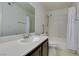 Clean bathroom with single vanity, bathtub, and shower at 1575 W Warm Springs Rd # 1621, Henderson, NV 89014