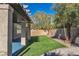 Artificial turf lawn with covered patio and block wall at 1670 Boundary Peak Way, Las Vegas, NV 89135