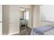 Small bedroom with mirrored closet and window at 319 Carrington St, Henderson, NV 89074