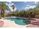 Resort style pool and spa with pergola and lush landscaping at 3326 Diego Bay Cir, Las Vegas, NV 89117